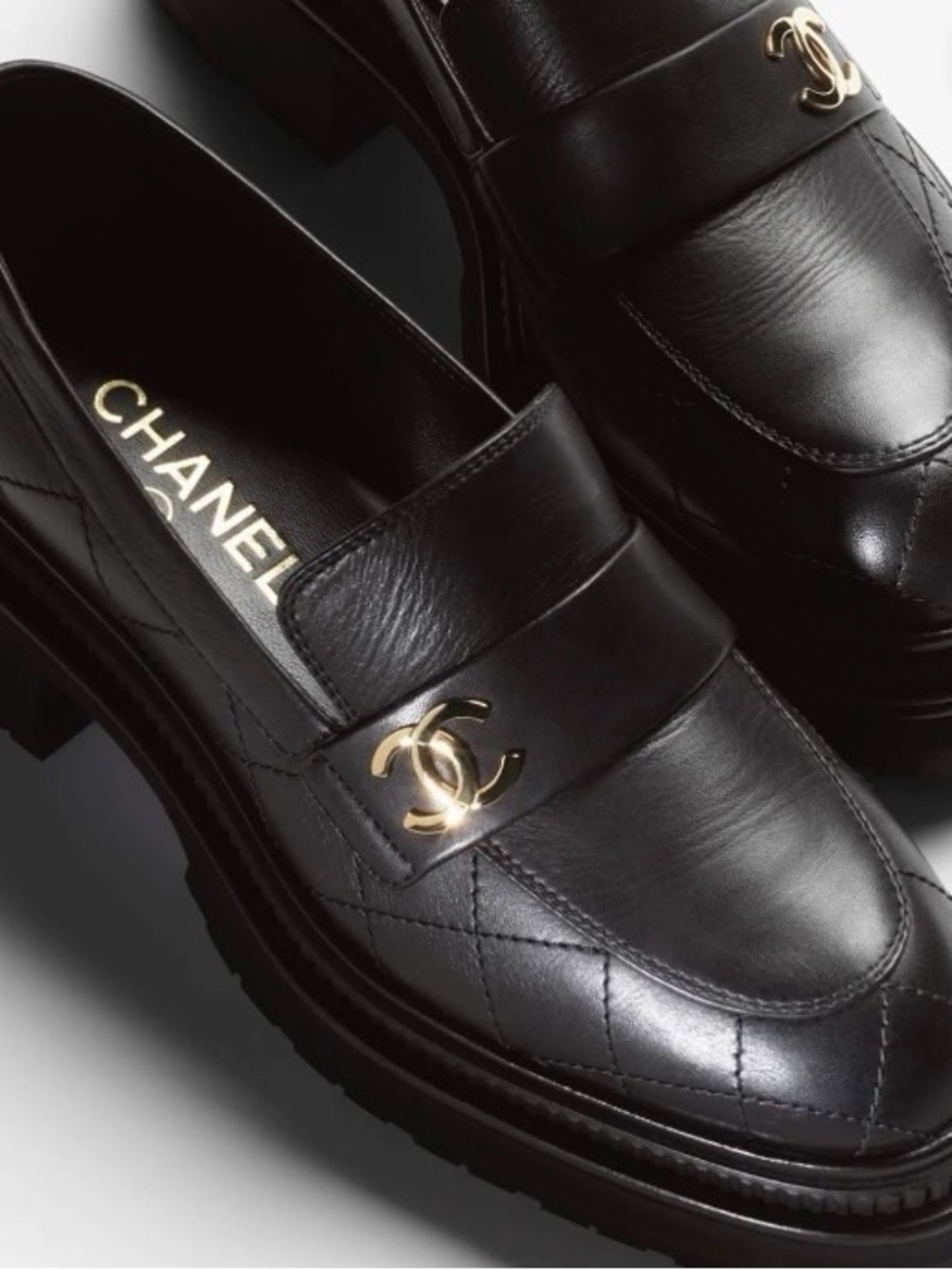 CHANEL 23A Black Quilted Calfskin Leather Loafers with Gold CC